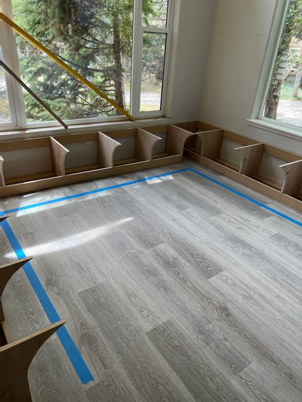 Built-in mudroom bench framing with custom dividers in progress